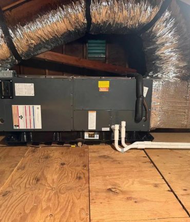 Air handler installed on an attic platform with insulated flex ductwork by AFAB Construction, West Milford NJ