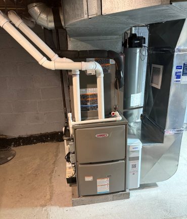 Lennox high-efficiency gas furnace with Aprilaire humidifier installed by AFAB Construction