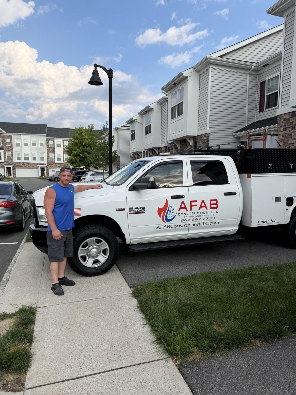 Bill, owner of AFAB Construction, with the AFAB HVAC service truck